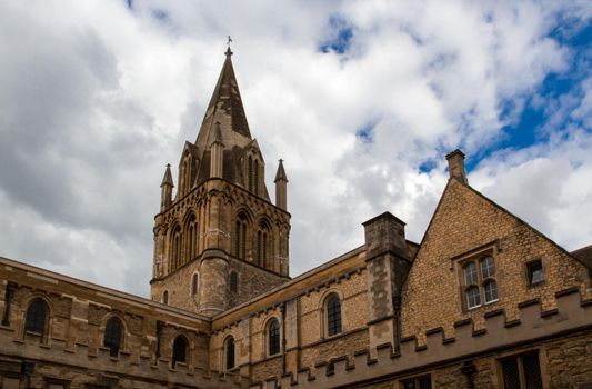 Low-angle view of Christ Church Cathedral tower on a cloudy day