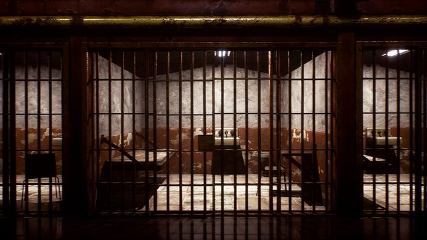 An old prison with empty closed cells. View of an ancient prison and empty prison cells.