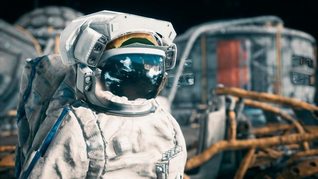 An astronaut stands beside his lunar rover at the space moon base. View of the future lunar colony.