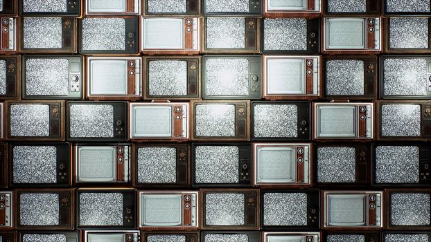 Several vintage TVs in an old building. TVs from the 70s and 80s, retro TVs with poor signal reception. Old televisions on an old table. Retro vintage atmosphere.