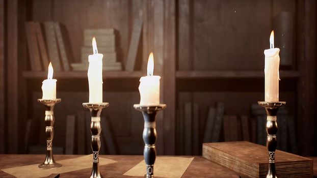 Candles on the table of an alchemist in a medieval ancient castle. View of the ancient castle and the candles.