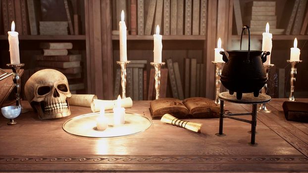 A skull and a manuscript with spells lie on the ancient table of the alchemist. View of the ancient alchemist's table.