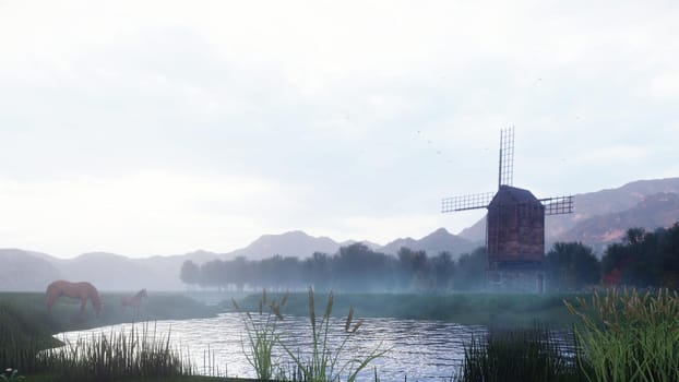 A rural misty morning landscape with an old windmill and horses next to a pond, grasses and plants swaying in the wind background a cloudy sky.