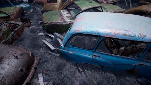 Car dump of old abandoned cars. Rusty damaged cars. A lot of destroyed, ruined, abandoned cars.