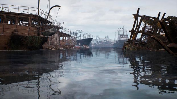 Rusty abandoned ships in the sea bay. Destroyed abandoned industrial ships.