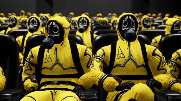 People in yellow protective suits sit in a movie theater waiting for a movie. People in a bacteriological protection suit and a gas mask. The concept of a post-apocalyptic world during a global epidemic.