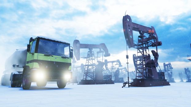 Industrial oil pumps operate in the winter and pump crude oil in an oil field.