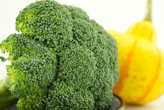 Fresh broccoli in close up on kitchen table, selective focus