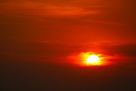 beautiful sunset orange yellow red silhouette dark sky in back on the cloud