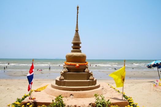 small sand pagoda in Songkran festival represents In order to take the sand scraps attached to the feet from the temple to return the temple in the shape of a sand pagoda