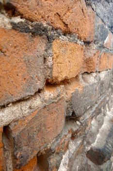 Wall of an old red brick building, background