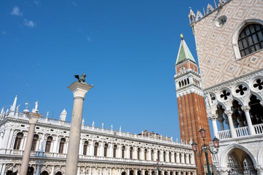 Part of the famous Doges Palace with the Campanile and the Marciana Library, seen in Venice, Italy