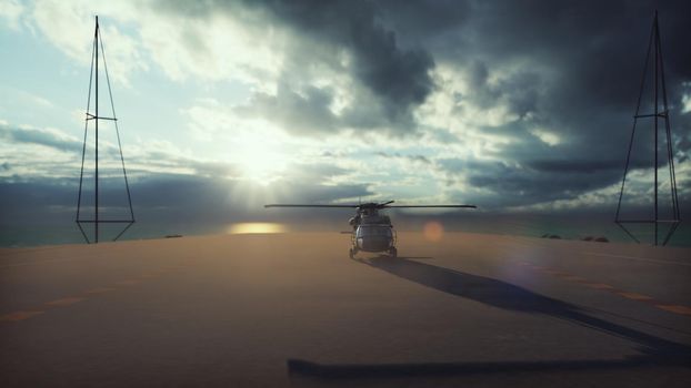 Military helicopter Blackhawk lands on an aircraft carrier in the endless blue ocean.