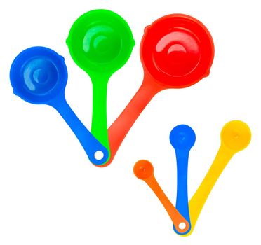 A Set Of Colorful Measuring Cups Or Spoons, Isolated On A White Background