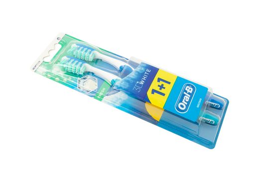 CHISINAU, MOLDOVA - MARTH 27, 2021: Oral-B 3D white toothbrush packaging isolated on white background with clipping path. Top view. Oral-B brand has been part of the Procter & Gamble company