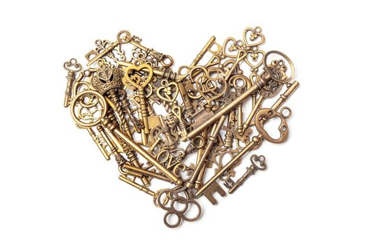 Old, vintage keys in the shape of a heart isolated on white bacground