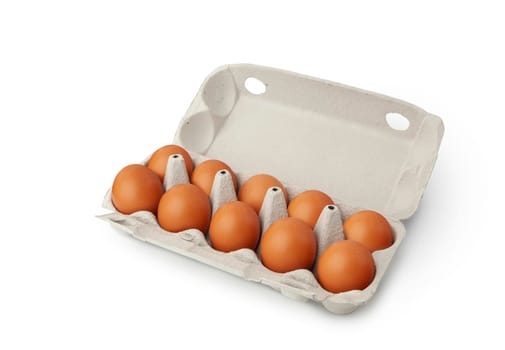 Open egg box with ten brown eggs isolated on white background. Fresh organic chicken eggs in carton pack or egg container with copy space