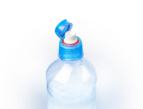 Plastic bottle of drinking water open cap. Isolated on white background. With clipping path.