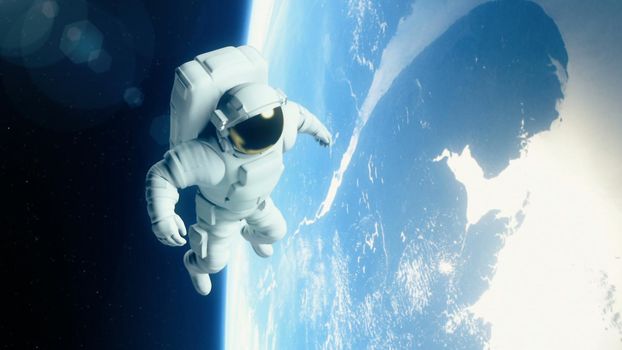 Astronaut in outer space is flying over the planet Earth