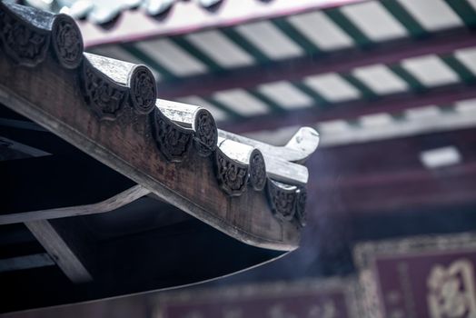Bangkok, Thailand - 27 Oct 2019 : Traditional patterns of the ancient Chinese Temple roof, Within the Dragon Temple Kammalawat (Wat Lengnoeiyi), Wat Leng Noei Yi is the most important Chinese Buddhist temple in Bangkok.