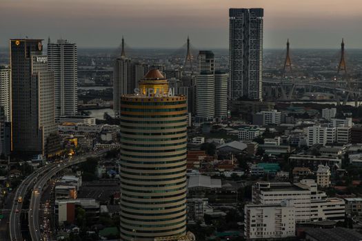 Bangkok, thailand - Mar 06, 2020 : Sky view of Bangkok with skyscrapers in the business district in Bangkok in the evening beautiful twilight give the city a modern style. Selective focus.