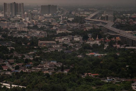 Bangkok, Thailand - Oct 05, 2019 : Aerial view of cars driving on highway junctions. Bridge roads with green garden and trees in connection of architecture concept. Top view. Urban city.