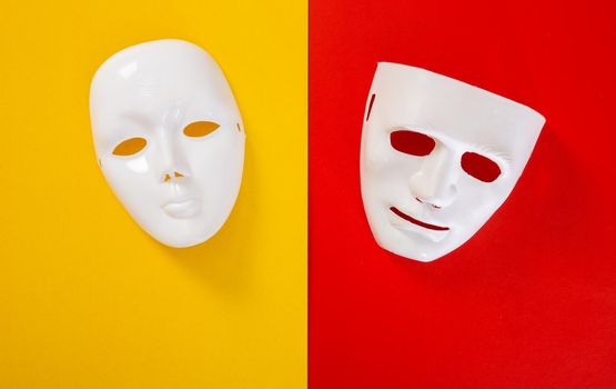 carnival white mask on red and yellow background