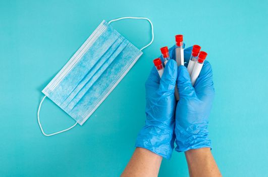 top view of doctor holding sample in test tube. Medical Concept