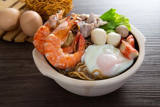 Clay Pot Yee Mee Seafood Noodle Soup with flavorful Cooked Ingredients