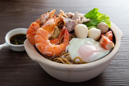 Clay Pot Yee Mee Seafood Noodle Soup with flavorful Cooked Ingredients