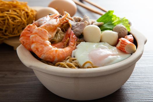 Clay Pot Yee Mee Seafood Noodle Soup with flavorful Cooked Ingredients