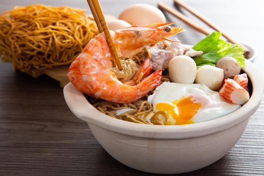 Clay Pot Yee Mee Seafood Noodle Soup with flavorful Cooked Ingredients