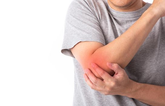 Sore pain of elbow. Sprain and arthritis symptoms. middle age man touching his hurt arm over white background.