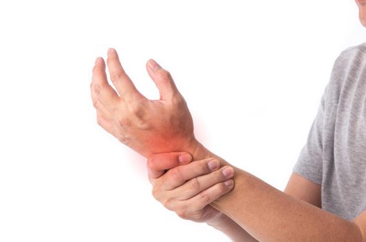 Sore pain of hand. Sprain and arthritis symptoms. middle age man holding his hurt hand over white background.