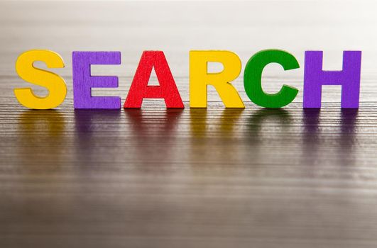 Search word text on wooden table. Ads and Search Theme
