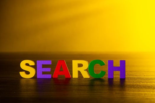 Search word text on wooden table. Ads and Search Theme