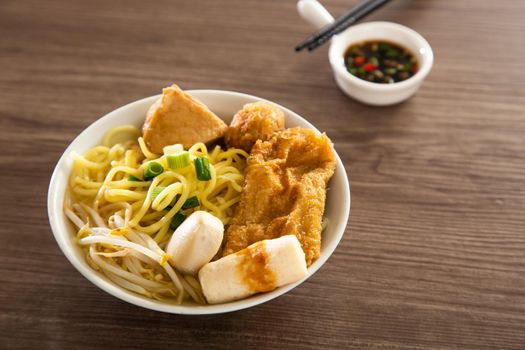 Kampar Fish ball noodle on wooden table