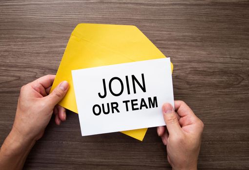 Join Out Team - Hand holding card with text. Recruitment concept