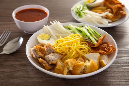 Mee Rojak is Malaysia Indian food of noodle with peanut sauce. One of very famous food in asia.