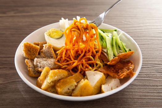 Mee Rojak is Malaysia Indian food of noodle with peanut sauce. One of very famous food in asia.
