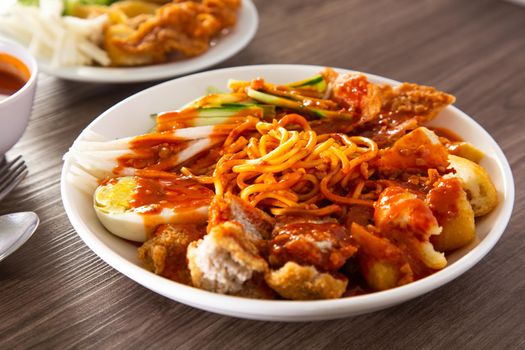 Mee Rojak is Malaysia Indian food of noodle with peanut sauce. One of very famous food in asia.