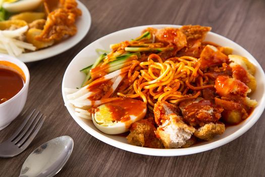 Mee Rojak is Malaysia Indian food of noodle with peanut sauce. One of very famous food in asia.