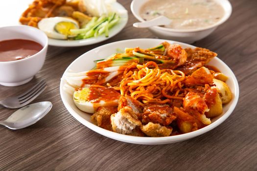 Mee Rojak is Malaysia Indian food of noodle with peanut sauce. One of very famous food in asia.