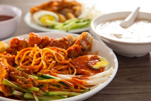 Mee Rojak is Malaysia Indian food of noodle with peanut sauce. One of very famous food in asia.