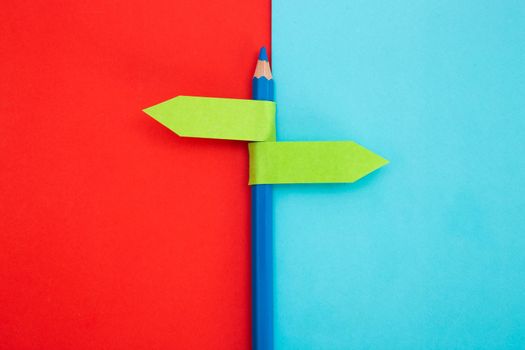 color pencil with direction indicator on color background