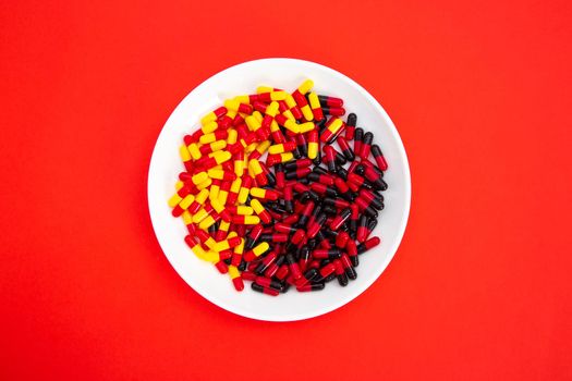A plate full with dieting pill- dieting concept