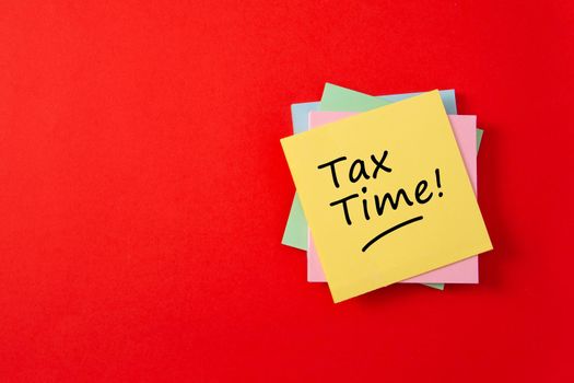 Tax time - Notification of the need to file tax returns and tax form with empty space for text.