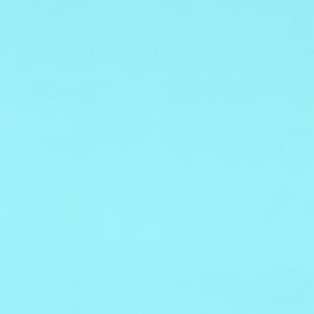 light blue turquoise cardboard texture useful as a background