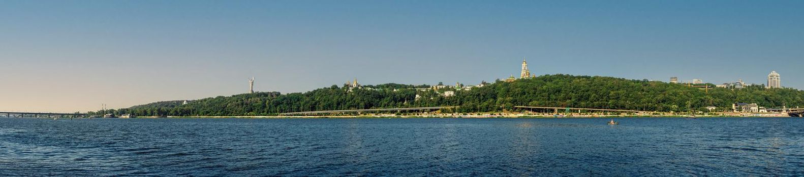 Kyiv, Ukraine 07.11.2020. View of the left bank and the Dnieper river in Kyiv, Ukraine, on a sunny summer morning