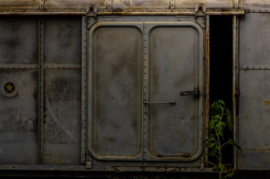 Vintage railroad container doors without rusty and old color at station, Door of old railroad bogie.